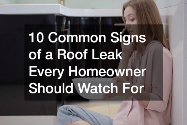 10 Common Signs of a Roof Leak Every Homeowner Should Watch For a woman calling for help because of her leaky roof